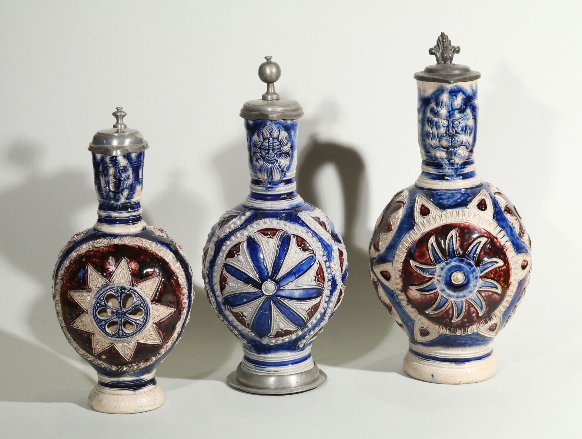 17th century works of art westerwald jugs with blue and manganese saltglaze