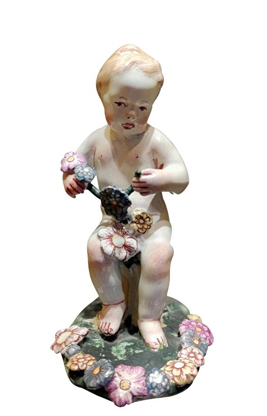 friedberg-faience-figure-angel-flowers-18th-century