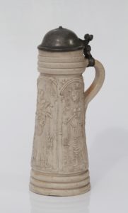 16th century stoneware Siegburg Flagon date 1565 with applied reliefs