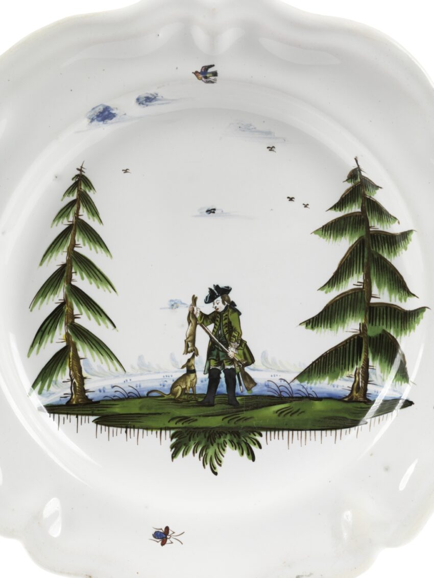 18th century works of art Kuenersberg faience hunting plate detail hunter with hound and furred game